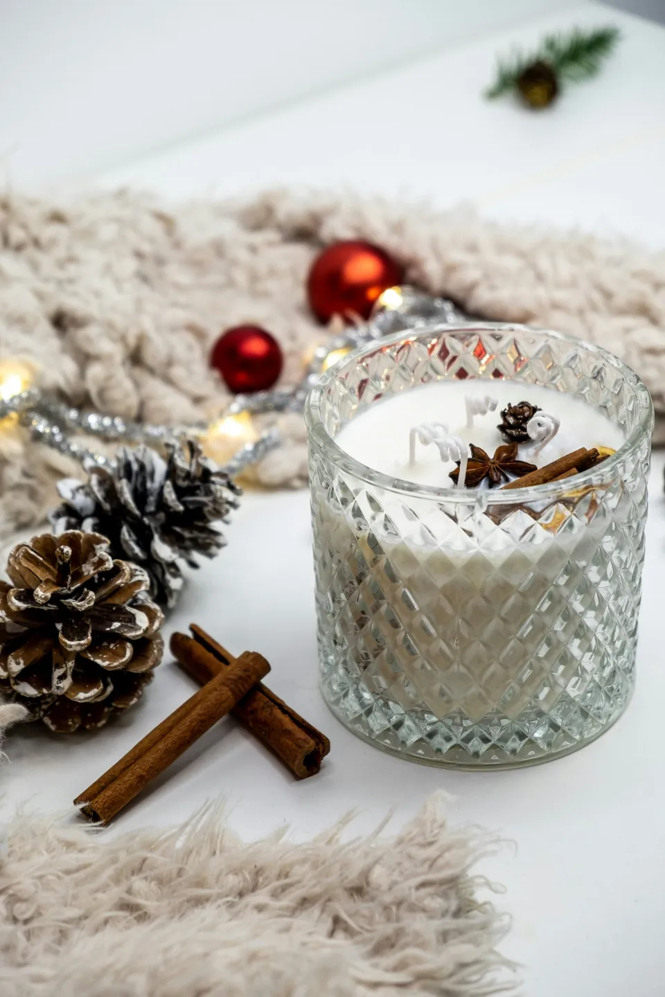 The shop&rsquo;s photo of a cut-glass candle with cinnamon and star anise