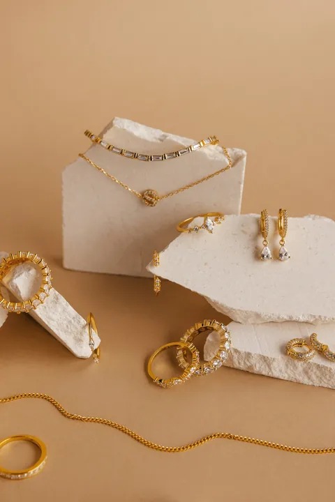 The jeweller&rsquo;s photo of the collection on white stone blocks